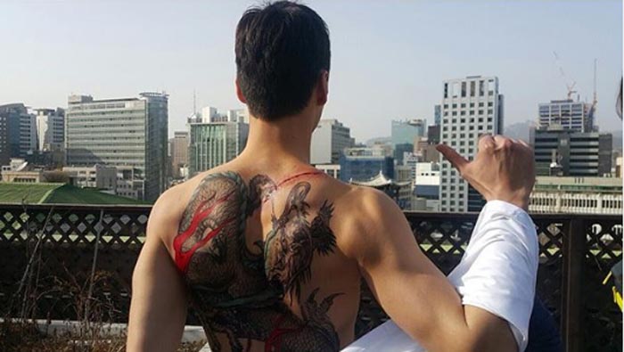 Lee Tae-Hwan dragon tattoo.